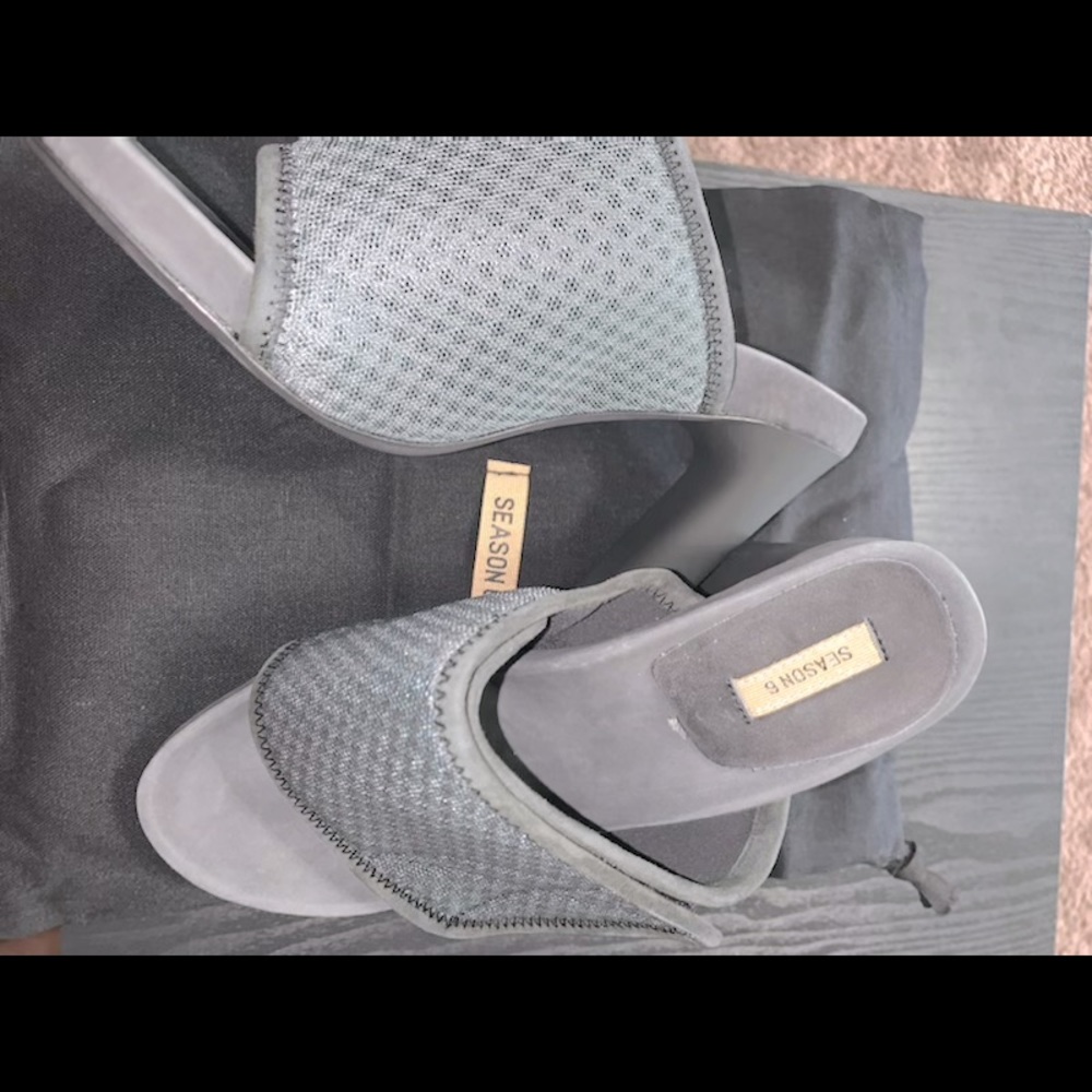 Season 6 Yeezy heel slides.